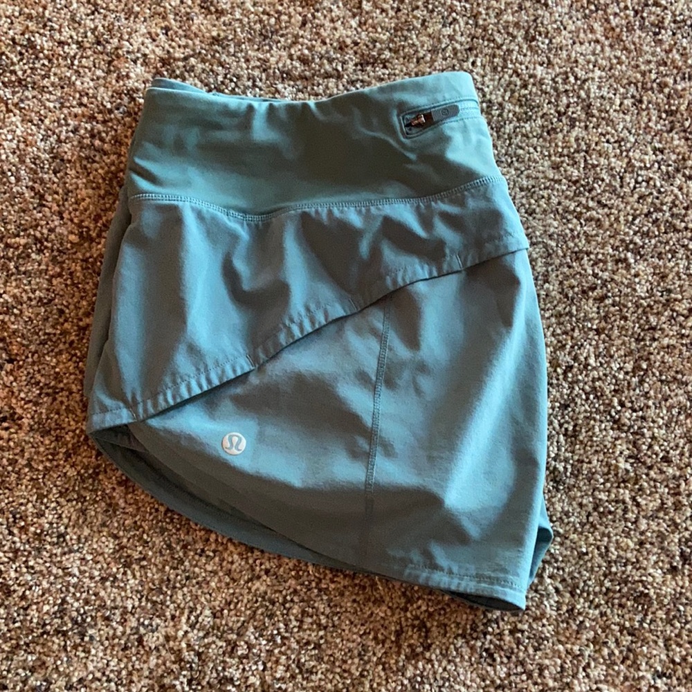 Teal lululemon speed up low rise shorts